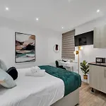 Micro Chic, Tiny Studio With Functional Desk